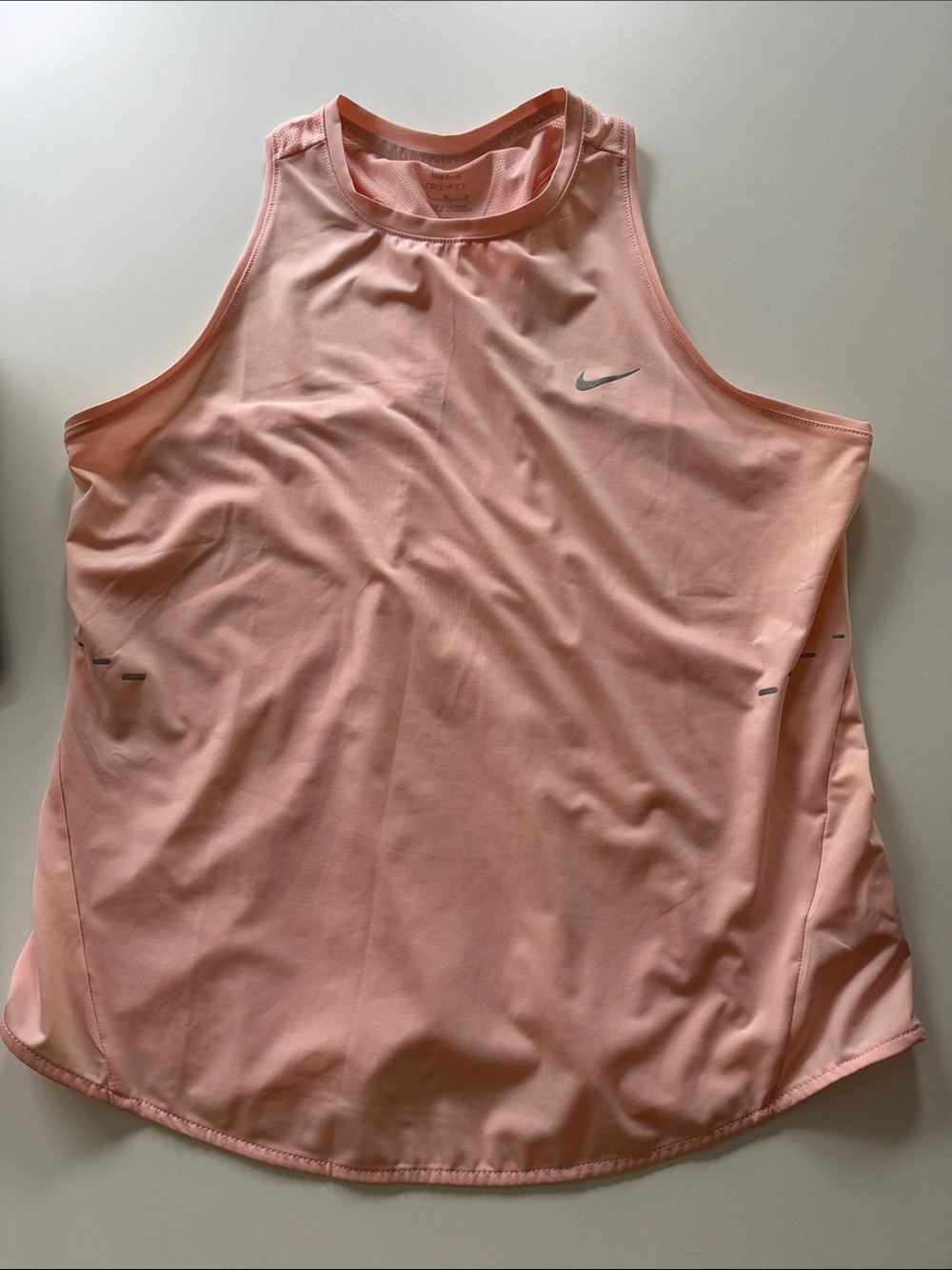 Nike Women’s Light Pink Athletic Tank with Reflective Swoosh